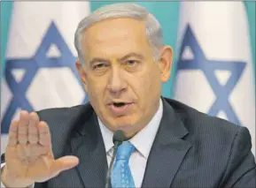  ?? ASSOCIATED PRESS PHOTO ?? Israeli Prime Minister Benjamin Netanyahu gestures as he speaks during a news conference at the prime minister’s office in Jerusalem, Wednesday.