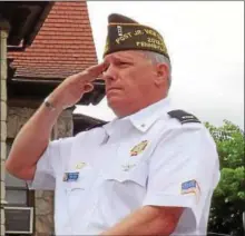  ?? SUBMITTED PHOTO ?? John G. Lorusso salutes during Armed Forces Day in 2013.