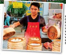  ??  ?? High life: Central Hong Kong island and, inset, a s street v vendor with some steamed food treats