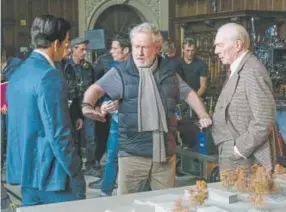  ?? Giles Keyte, Provided by Sony Pictures ?? Christophe­r Plummer, right, and director Ridley Scott on the set of TriStar Pictures’ “All the Money in the World.”