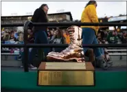  ?? SPECIAL TO THE DENVER POST ?? The Bronze Boot trophy sits on the sidelines during the Border War rivalry football game at War Memorial Stadium on Saturday, November 6, 2021. Austin Humphreys