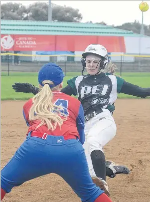  ?? JASON MALLOY/THE GUARDIAN ?? Kailey Koughan slides safely into third base Wednesday against British Columbia at the Canada Games women’s softball tournament in Manitoba.