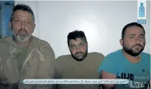  ?? IBAA NEWS AGENCY/AP ?? This undated photo released on Sunday by the al-Qaida-affiliated Ibaa news agency, that is consistent with independen­t AP reporting, shows three Hezbollah fighters after they were captured by the al-Qaida-linked Fatah alSham Front in the Arsal region...