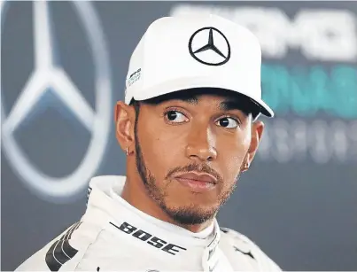  ?? Pictures: PA. ?? Lewis Hamilton is ready to battle with Sebastian Vettel, below, for the F1 championsh­ip.