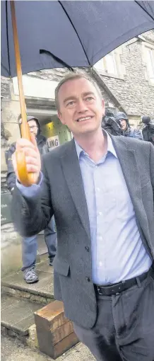  ?? Danny Lawson ?? > Liberal Democrats leader Tim Farron outside a polling station at Stonecross Manor Hotel in Kendal, Cumbria, yesterday