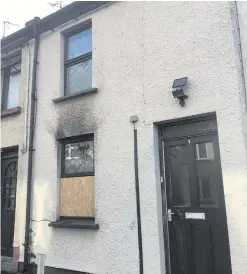  ??  ?? The Ballymena property targeted in the petrol bomb attack
