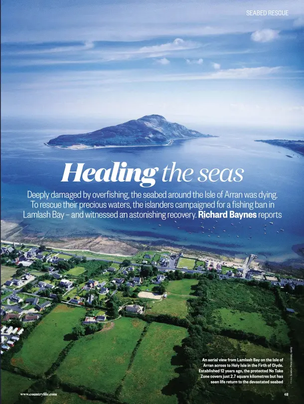  ??  ?? An aerial view from Lamlash Bay on the Isle of Arran across to Holy Isle in the Firth of Clyde. Establishe­d 12 years ago, the protected No Take Zone covers just 2.7 square kilometres but has seen life return to the devastated seabed