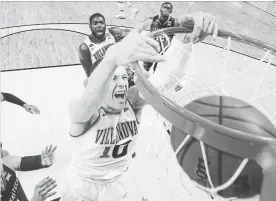  ?? ELSA GETTY IMAGES ?? Donte DiVincenzo of the Villanova Wildcats dunks against Texas Tech on Sunday in Boston. Villanova won 71-59.