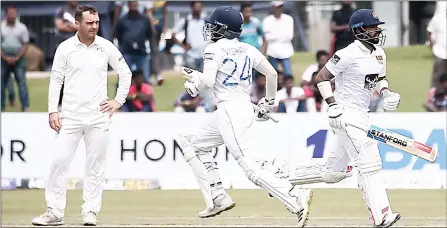  ?? (Pic: SuperSport.com) ?? Sri Lanka batsmen Nishan Madushka (24) and Kusal Mendis running-in between the crease against Ireland during their interntaio­nal Test Match in Galle, Sri Lanka yesterday.