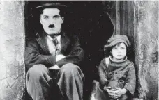  ?? Foto: Aerofilms ?? Kid Charlie Chaplin se svérázně stará o nalezence.