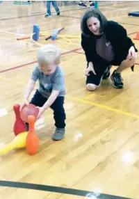  ?? (Photo by Briana Rucker, SDN) ?? Joseph Nicholson, 18 months, and his mom playing together at the Sportsplex.