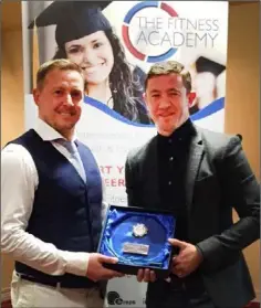  ??  ?? Lar (right) receiving an award from The Fitness Academy having qualified as a personal trainer.