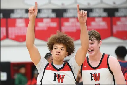  ?? PHOTO BY ANDY HOLZMAN ?? Harvard-Westlake's Trent Perry, left, and Nikolas Khamenia celebrate after defeating Roosevelt in the CIF State SoCal Regional Open Division final.