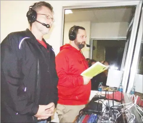  ?? TIMES photograph by Annette Beard ?? Mark Laster and Matt Wood provided play by play accounts of the Pea Ridge Blackhawk football games throughout the season and playoffs.