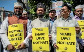  ??  ?? Worshipper­s from East London Mosque attend a gathering at a nearby park in remembranc­e of the Manchester victims.