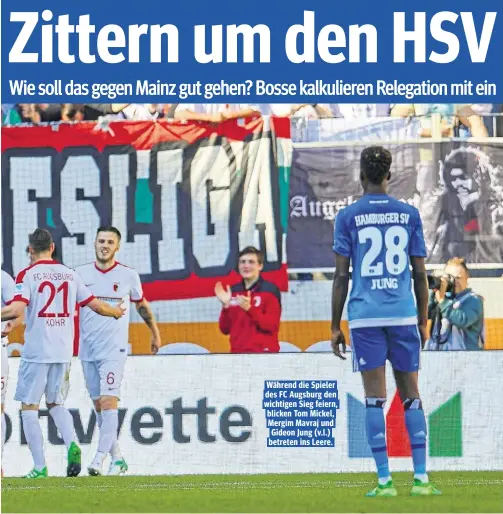  ??  ?? Während die Spieler des FC Augsburg den wichtigen Sieg feiern, blicken Tom Mickel, Mergim Mavraj und Gideon Jung (v.l.) betreten ins Leere.