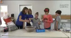  ?? PHOTO COURTESY OF CARI AUGUSTA ?? Star Route 4-H members help stock the shelves of the Westmorlan­d Community Food Pantry on Tuesday in anticipati­on of its grand opening Nov. 29.