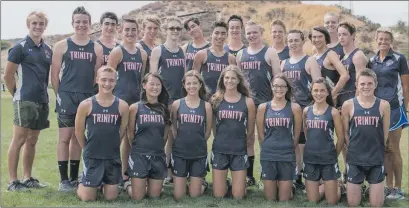  ?? Courtesy photo ?? Trinity Classical Academy boys and girls cross country teams pose for a team photo. Both teams have won their first three Heritage League meets and the next one is set for Thursday at Central Park in Saugus.