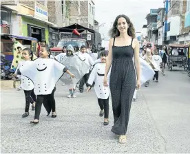  ??  ?? RAYS OF HOPE: Kerstin Forsberg takes part in a street parade to raise awareness for manta ray protection