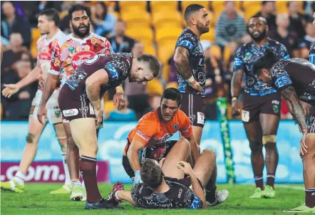  ?? Picture: ADAM HEAD ?? Tom Trbojevic recieves treatment after the Sea Eagle was tackled against the Broncos last weekend.