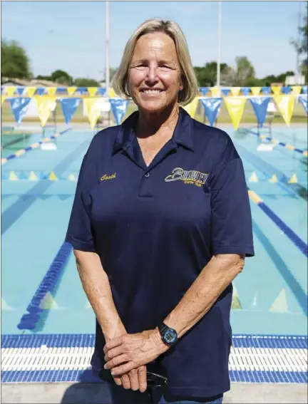  ?? VINCENT OSUNA PHOTO ?? Brawley Union High's swim coach D'Ann Luckey poses by the Lions Center Pool in Brawley on Wednesday afternoon.