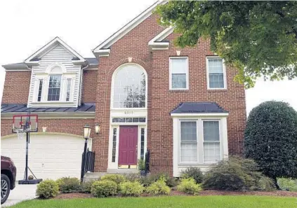  ?? BARBARA HADDOCK TAYLOR/BALTIMORE SUN PHOTOS ?? Paola and Matt Treese bought this three-bedroom home in the Village of Long Reach in 2006.