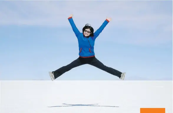  ??  ?? Ellany Lea leaps for joy at Salar de Uyuni in Bolivia, the world’s largest salt flat. “Countries call to me when it’s time for me to visit them,” she says.