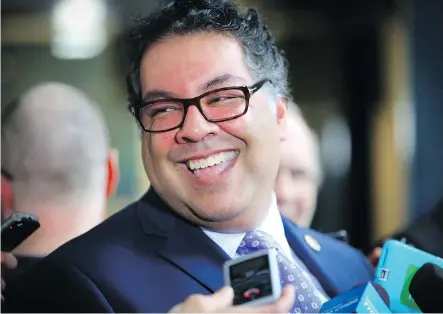  ?? AL CHAREST ?? Mayor Naheed Nenshi answers questions after council agreed to continue exploring whether Calgary should bid for the 2026 Olympics.