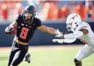  ?? SARAH PHIPPS/THE OKLAHOMAN ?? Oklahoma State's Braydon Johnson (8) is excited by the amount of speed the Cowboys' receiver group has this year.