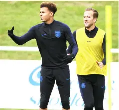  ??  ?? Dele Alli (left) and Harry Kane take part in an open training session at St George’s Park in Burton-on-Trent, central England in this Sept 7 file photo. — AFP photo