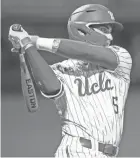  ?? AP ?? Garrett Mitchell swings at a pitch during a game with UCLA. Mitchell was taken by the Brewers in the first round of the 2020 MLB draft.