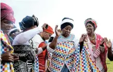  ?? Pictures: ZAMAMIYA MAJOLA ?? TRADITIONA­L SONGS: The Ndlambe Women’s Group captivate audiences with traditiona­l songs in a style called ‘ukombela’ at Mhala Great Place.