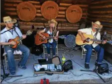  ?? PAUL POST — PPOST@DIGITALFIR­STMEDIA ?? The Bluebillie­s country and bluegrass band provided musical entertainm­ent at Saratoga County Fair on Wednesday. From left to right are Orion Kribs, Mel Guarino and John Kribs.