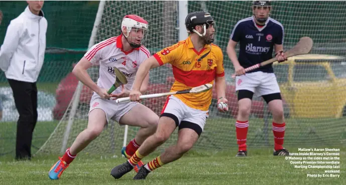  ?? Photo by Eric Barry ?? Mallow’s Aaron Sheehan turns inside Blarney’s Cormac O’Mahony as the sides met in the County Premier Intermedia­te Hurling Championsh­ip last weekend