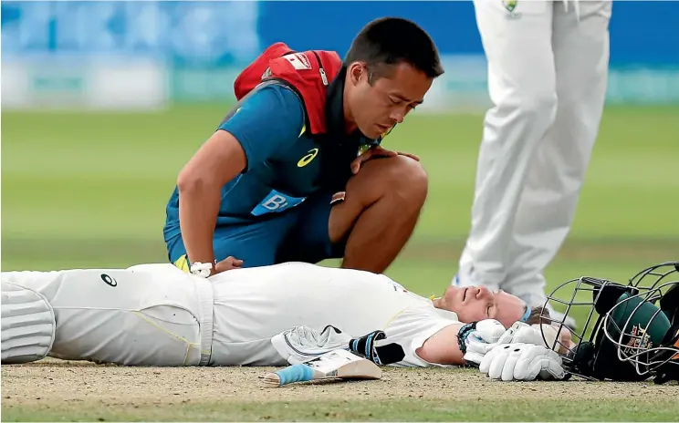  ?? AP ?? Star Australian batsman Steve Smith lies prone on the Lord’s pitch after being hit in the neck by a delivery from England fast bowler Jofra Archer.