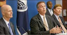  ?? BILL INGRAM / THE PALM BEACH POST 2015 ?? Chief Financial Officer Jeff Atwater (center), flanked by Gov. Rick Scott (left) and Agricultur­e Commission­er Adam Putnam, will leave office Friday.