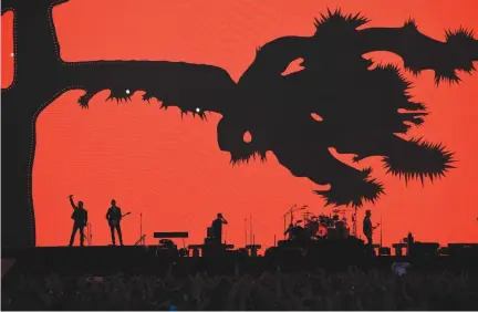  ?? REUTERS ?? U2 PERFORM during their U2: The Joshua Tree Tour, at Twickenham Stadium, London on July 8.