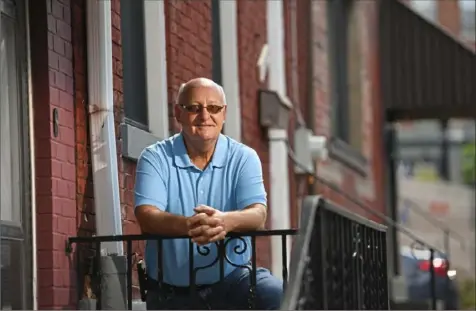  ?? Steve Mellon/ Post- Gazette ?? Ken Nowosielsk­i at the Lawrencevi­lle house he’s hoping to sell. The house has been in his family for more than 30 years. He inherited the property when his mother died two years ago, and he’s ready to move on.