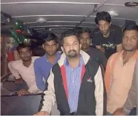  ?? — Supplied photo ?? Girish Pant with a group of workers in distress.