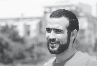  ?? COLIN PERKEL /THE CANADIAN PRESS ?? Omar Khadr, 30, was a child soldier when captured by American soldiers in Afghanista­n in 2002, but wasn’t treated as one, argues a former counter-intelligen­ce officer.