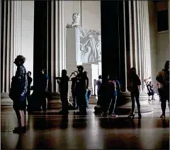  ?? BRENDAN SMIALOWSKI/AFP ?? People visit the Lincoln Memorial on the National Mall on May 27 in Washington, DC.