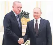  ?? FOTO: DPA ?? Vereinbart­en einen Waffenstil­lstand: der türkische Präsident Recep Tayyip Erdogan und Wladimir Putin.
