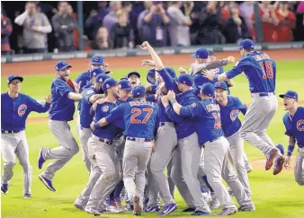  ?? CHARLIE RIEDEL/AP FILE ?? The Chicago Cubs celebrate winning the 2016 World Series. Manager Joe Madden will have the luxury of plenty of talent to build his 2017 lineup.