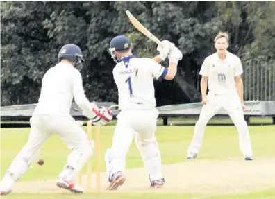  ?? Peter Rogan ?? ● Tom Hartley claims the wicket that won Ormskirk CC the Competitio­n Premier title in 2017