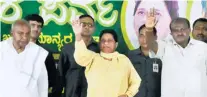  ??  ?? JD (S) CHIEF H.D. Deve Gowda, BSP supremo Mayawati, and JD(S) State president H.D. Kumaraswam­y at a rally in Mysuru on April 25.