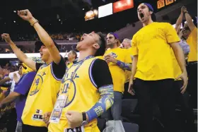  ?? Santiago Mejia / The Chronicle ?? Right: Preston Jeung (left), Chris Chao, Ivan Sayad and Narsai Tailo of San Francisco cheer during the second quarter at Oracle Arena.