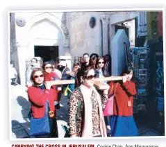  ??  ?? CARRYING THE CROSS IN JERUSALEM. Cookie Chan, Ann Momongan and Cherry Lynn Callelero.