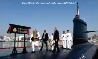  ??  ?? Prime Minister Narendra Modi on the casing of INS Kalvari