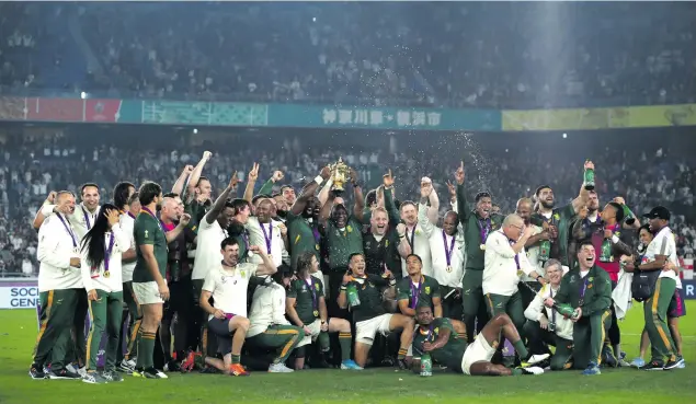  ?? Photos: Cameron Spencer/Ashley Vlotman/Gallo Images/Getty Images ?? Above: President Cyril Ramaphosa lifts the Web Ellis Cup with Bok captain Siya Kolisi following their victory against England in the Rugby World Cup 2019 Final. Below: Springbok coach Jacques Nienaber will soon meet with players in groups, for the first time since he was appointed head coach in early 2020.