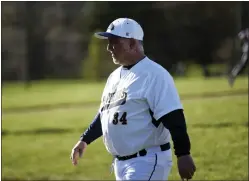  ?? OWEN MCCUE - MEDIANEWS GROUP ?? Pope John Paul II manager Charles DeLuzio walks off the field after a pep talk during Wednesday’s ‘Strike Out Cancer’ game against Pottsgrove at PJP.